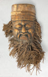 Hand-made carved bearded face in bamboo from southern China
