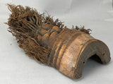 Hand-made carved bearded face in bamboo from southern China